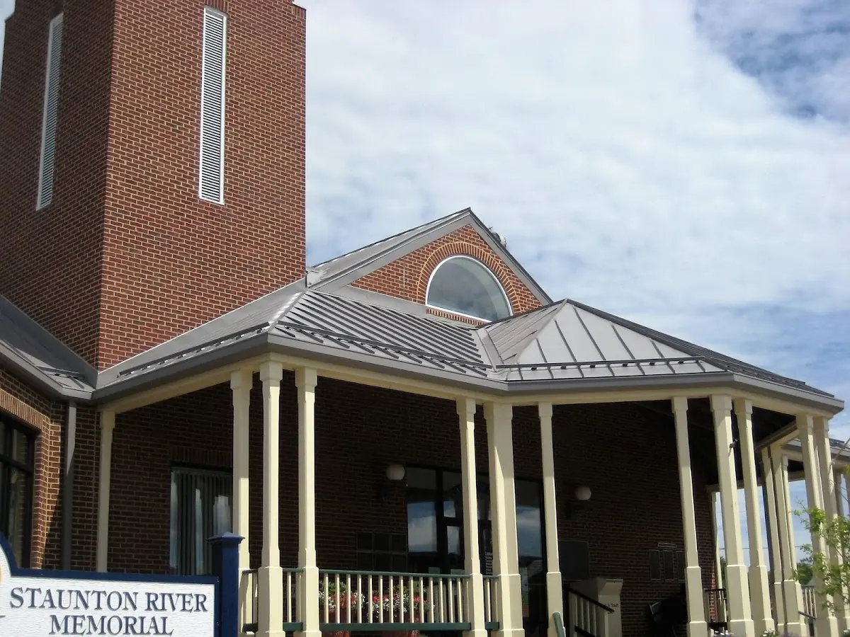 Skilled roofing craftsmen working on a residential roof in Beaverdale
